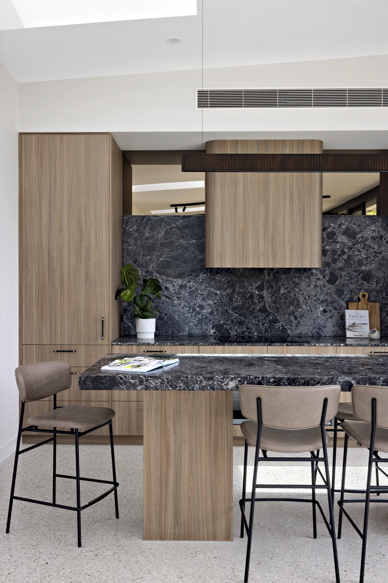 Stone and timber kitchen at Waterfall Gully Road