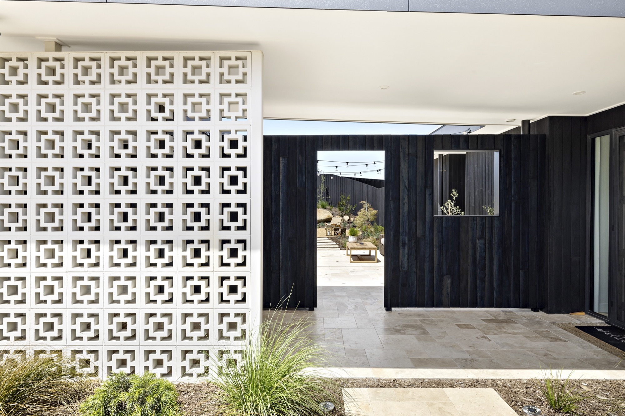 Waterfall Gully Road at night — breeze-block entry glowing